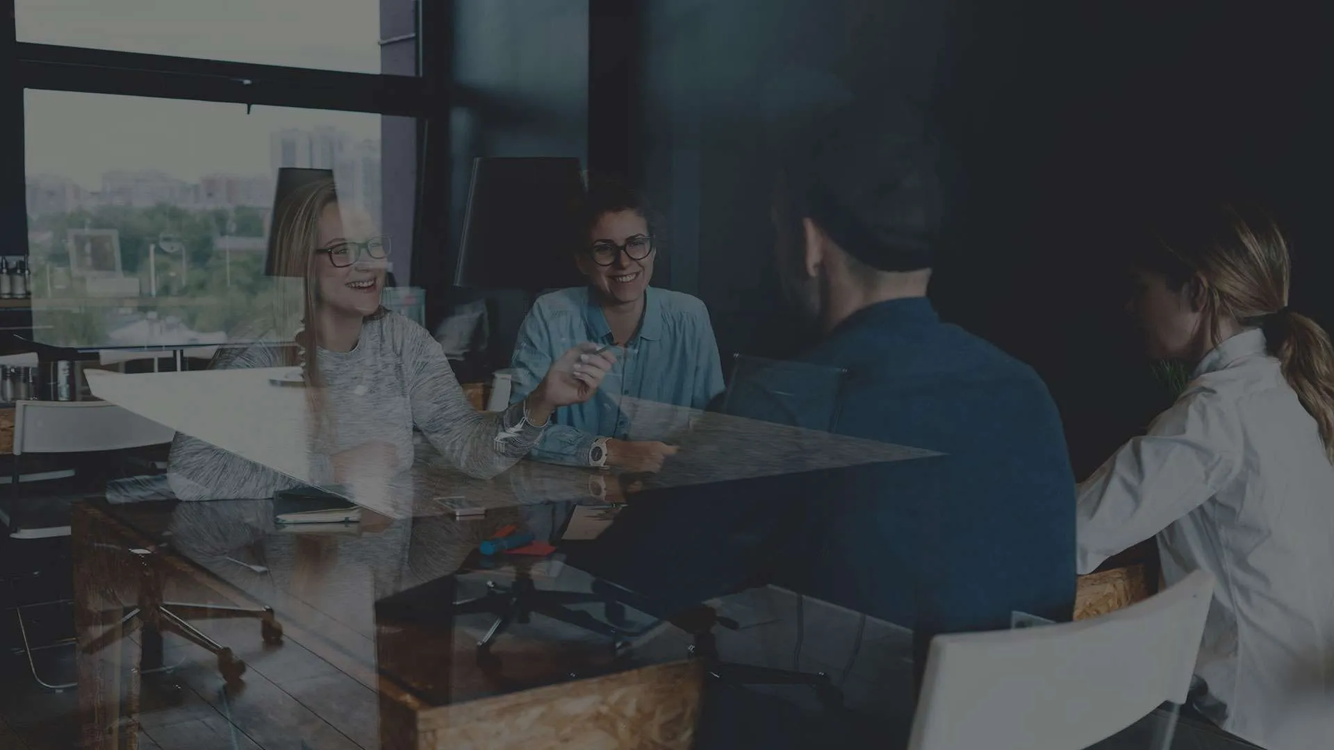 A Gruntify team member laughing during a meeting