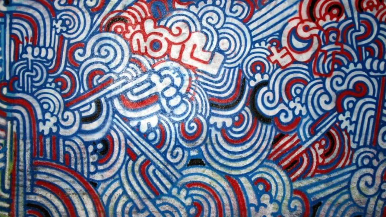 A mural of swirling red, white and blue lines