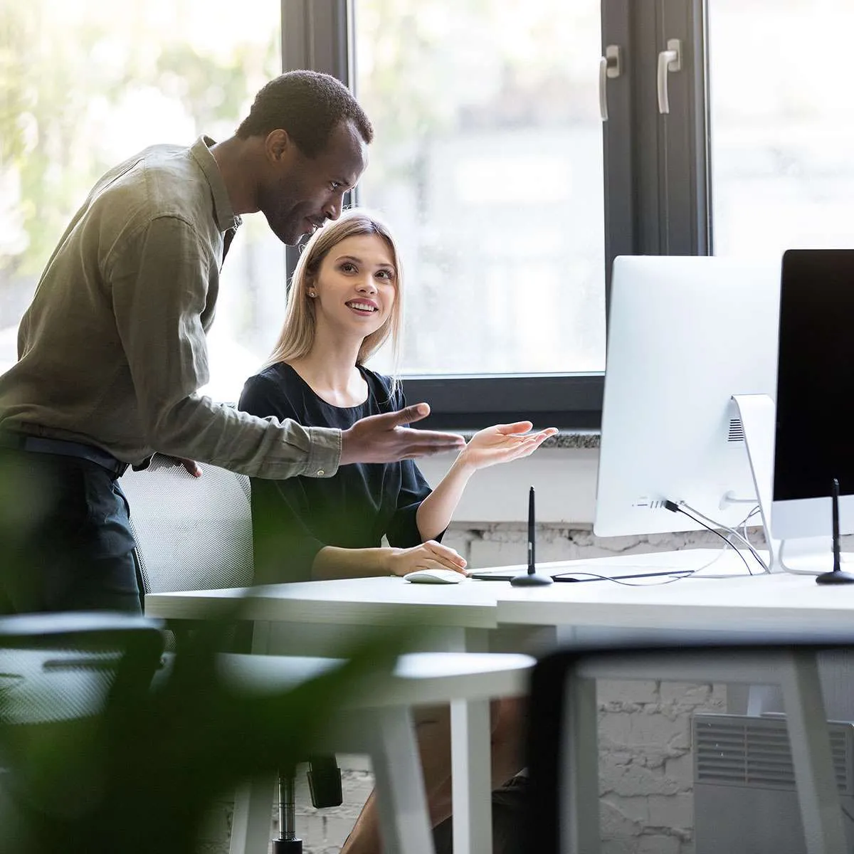Two partners reviewing a land access plan together