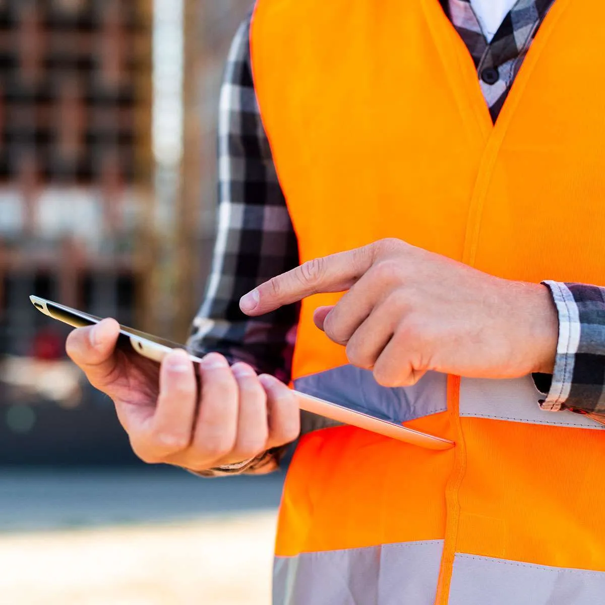 An engineer syncing pit inspection data from a tablet