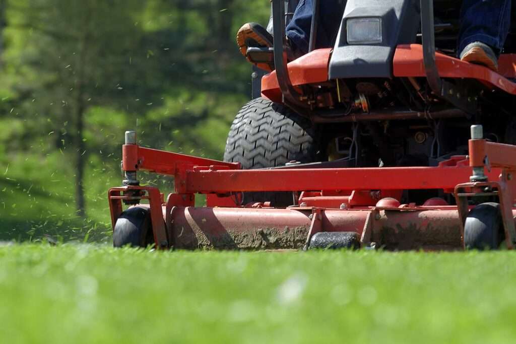 Ride On Mower Close Up Performing Vegetation Control