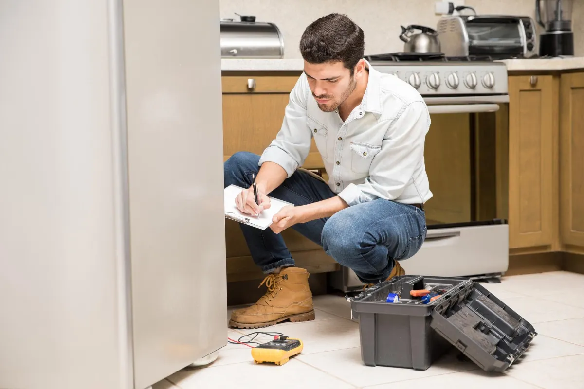 technician doing home inspection